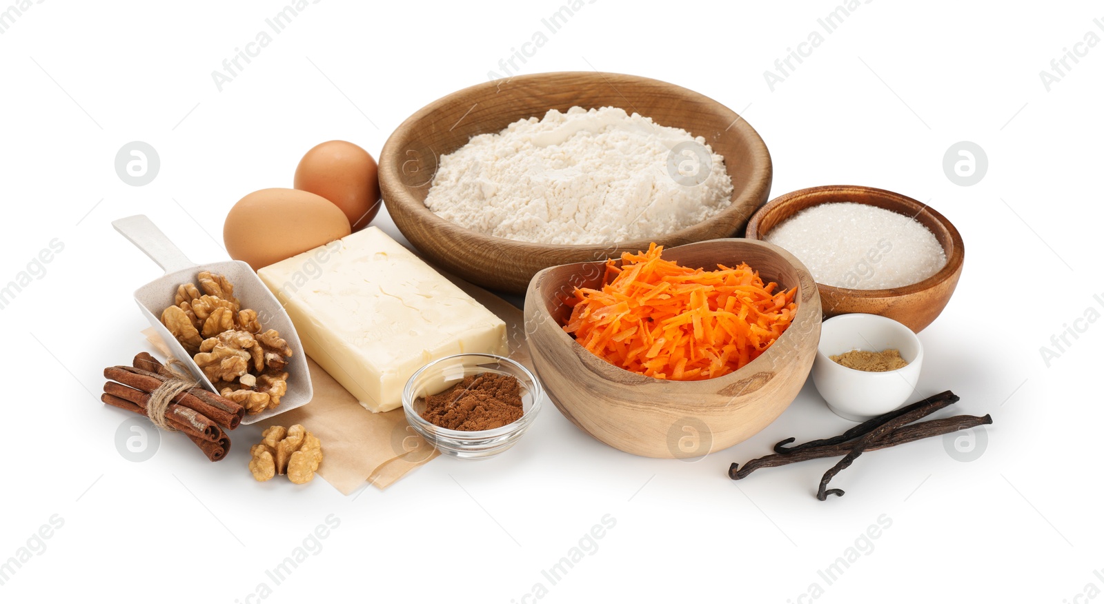 Photo of Different ingredients for making carrot cake isolated on white