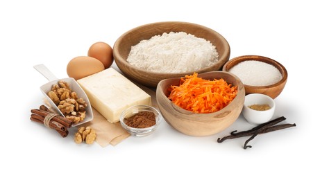 Photo of Different ingredients for making carrot cake isolated on white