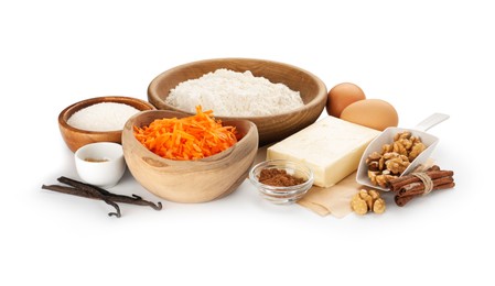 Photo of Different ingredients for making carrot cake isolated on white