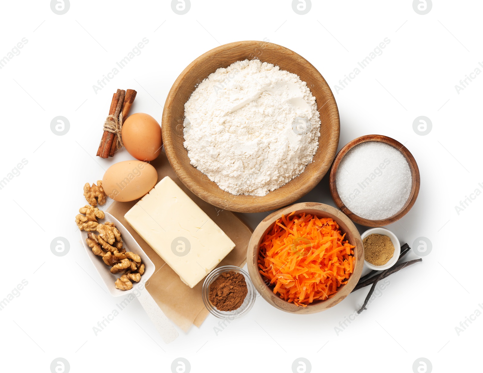 Photo of Different ingredients for making carrot cake isolated on white, top view