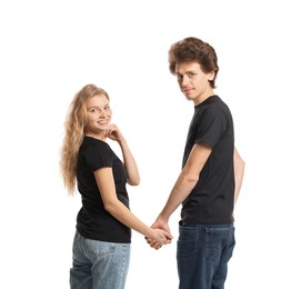 Photo of Young woman and man wearing blank black t-shirts on white background. Mockup for design