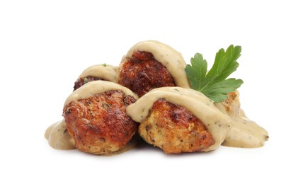 Photo of Delicious meatballs with creamy sauce isolated on white