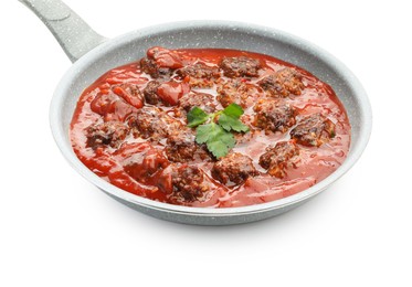 Photo of Delicious meatballs with tomato sauce in frying pan isolated on white