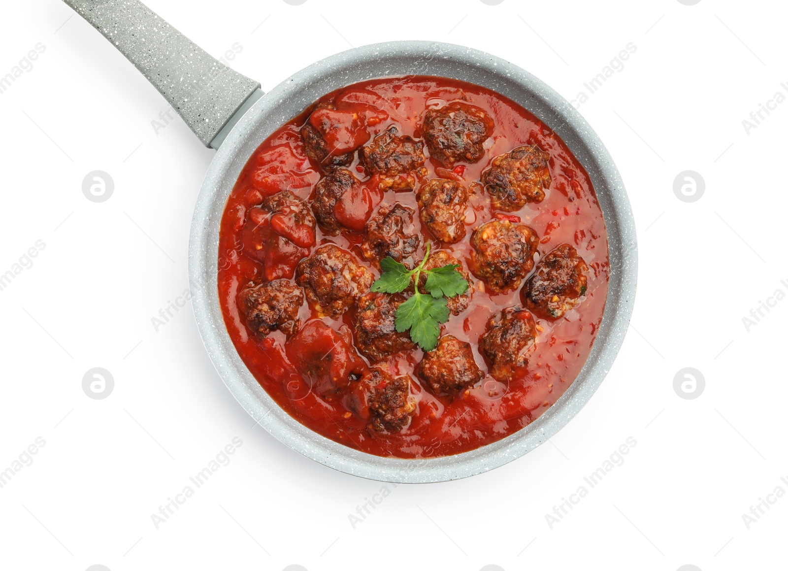 Photo of Delicious meatballs with tomato sauce in frying pan isolated on white, top view