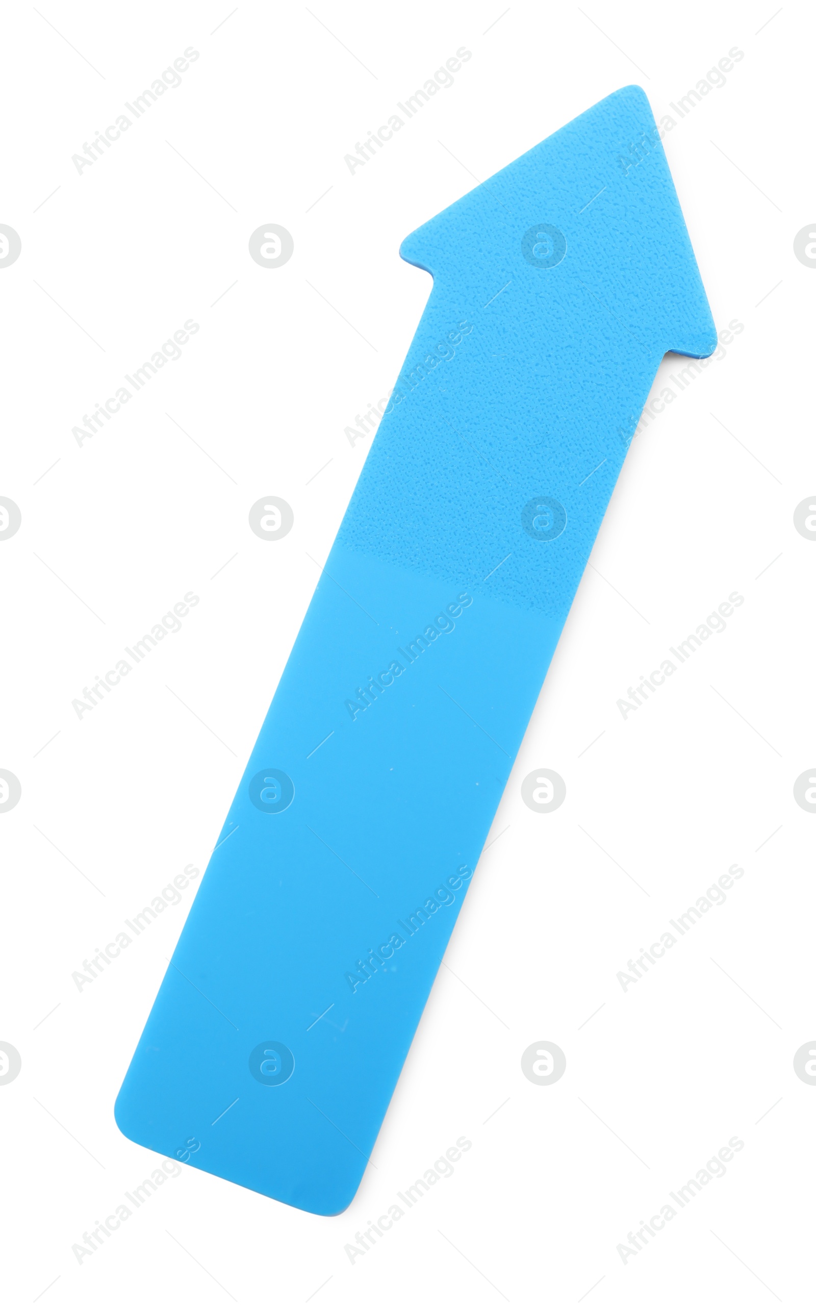 Photo of One blue paper arrow isolated on white, top view