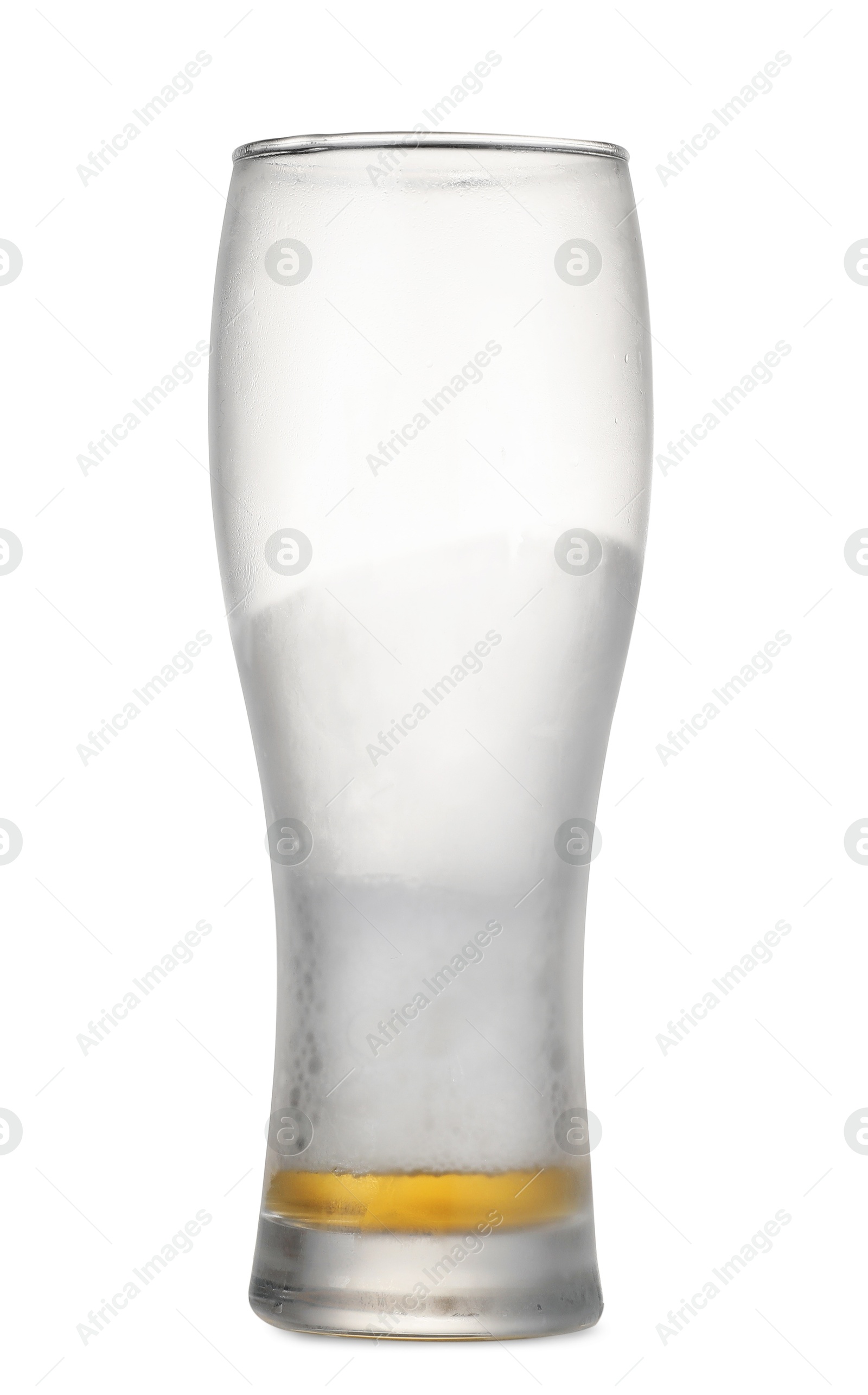 Photo of Almost empty glass of beer isolated on white