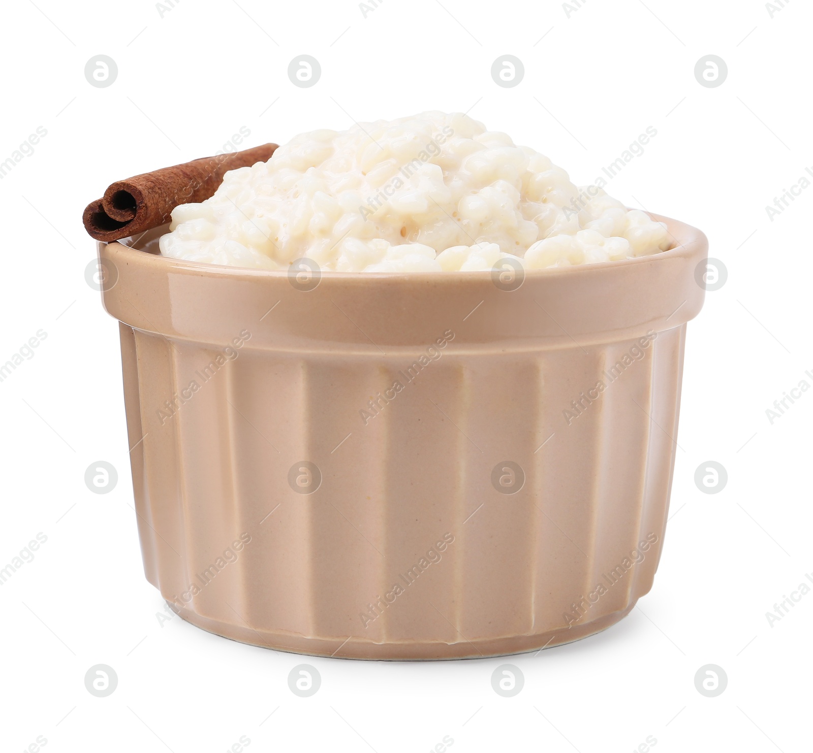 Photo of Tasty rice pudding with cinnamon isolated on white