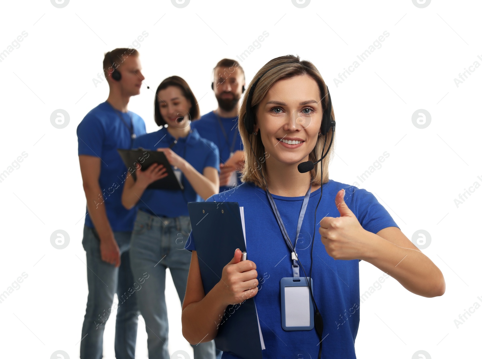 Photo of Technical support call center. Team of friendly operators on white background