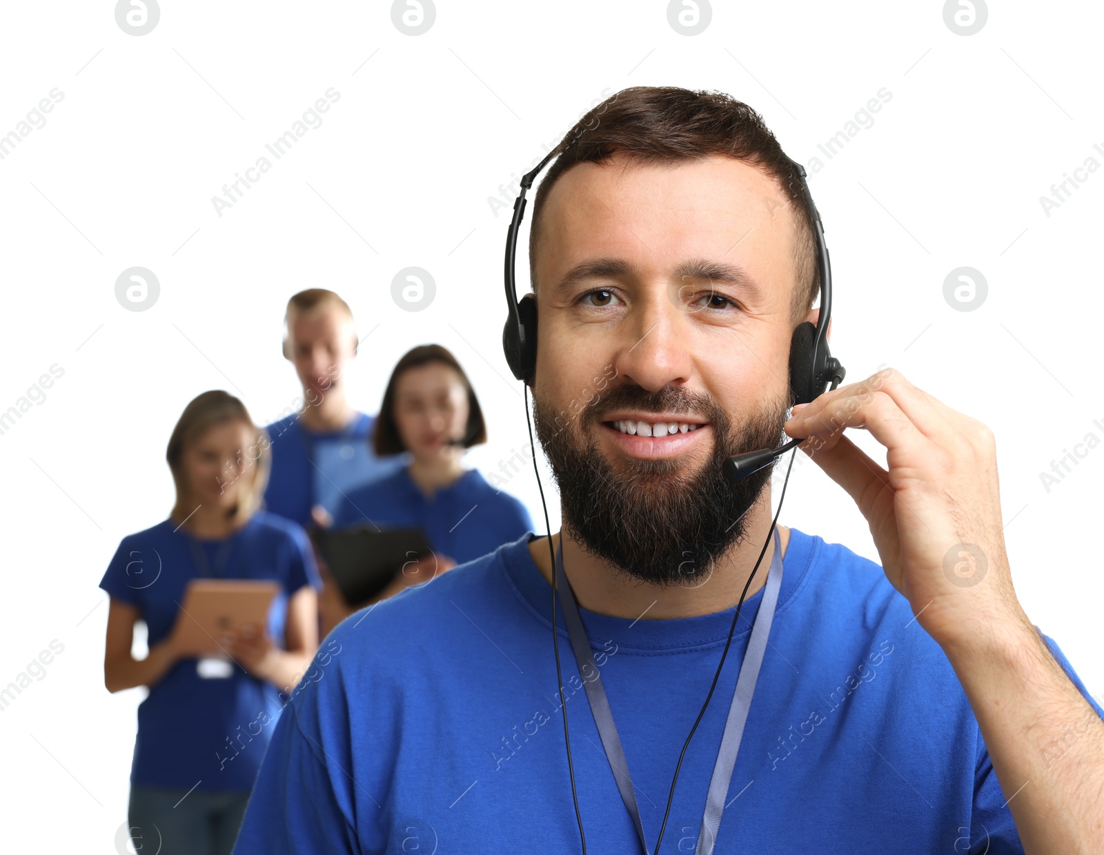 Photo of Technical support call center. Team of friendly operators on white background