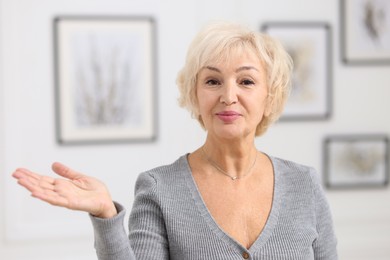 Portrait of grandmother with beautiful makeup at home