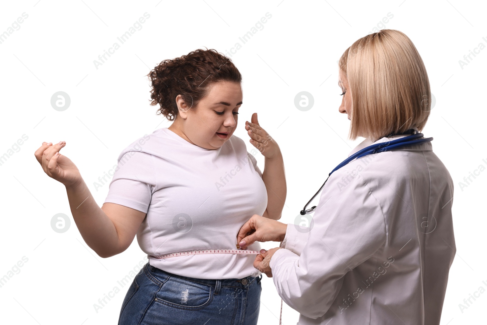 Photo of Weight loss. Nutritionist measuring patient's waist with tape on white background