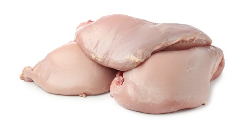 Photo of Three raw turkey breasts isolated on white