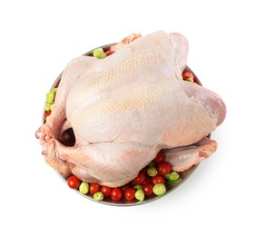 Photo of Whole raw turkey with vegetables isolated on white, top view