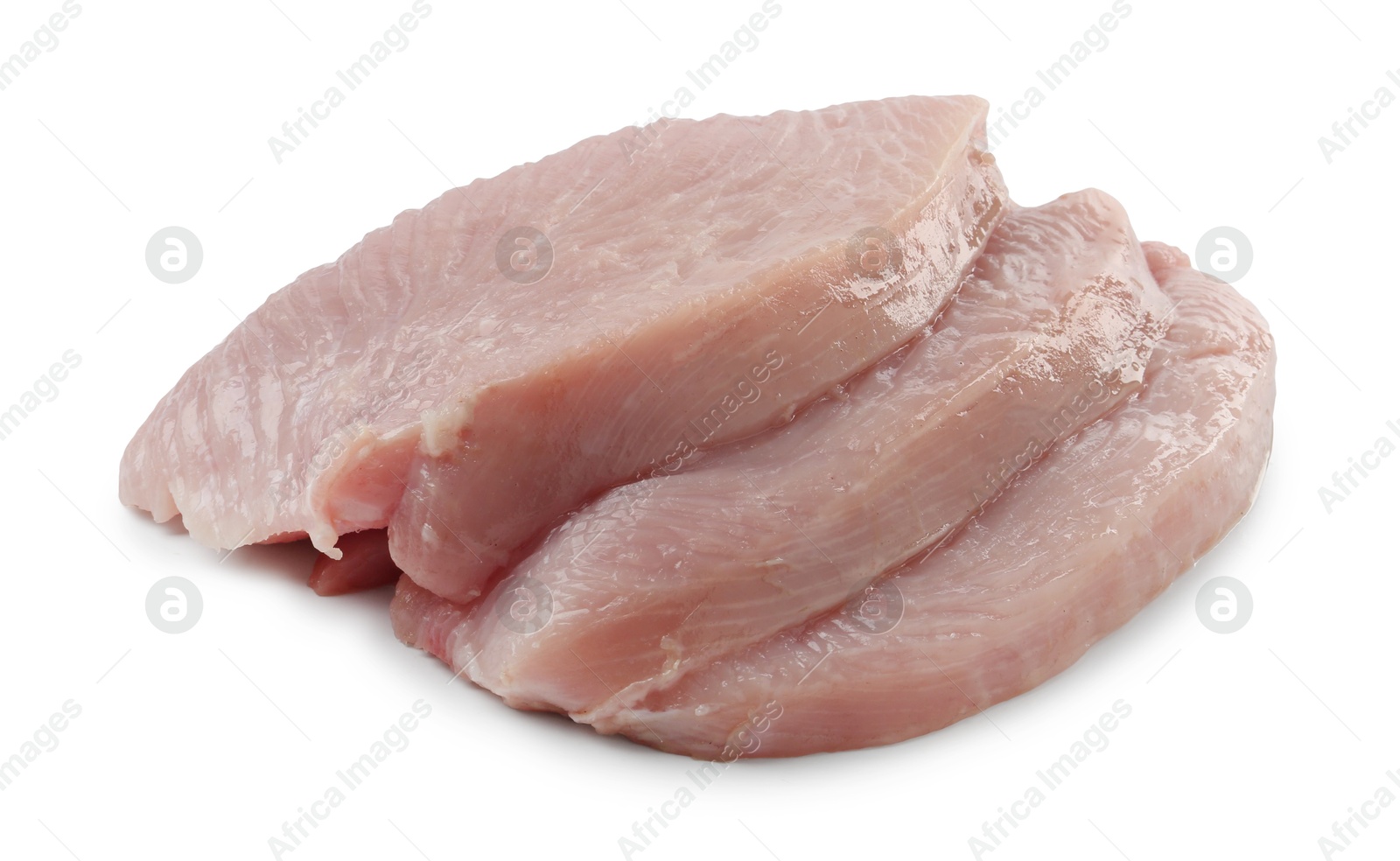 Photo of Pieces of raw turkey meat isolated on white