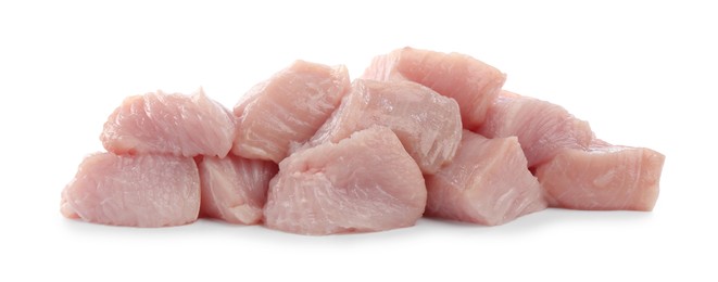 Photo of Pieces of raw turkey meat isolated on white