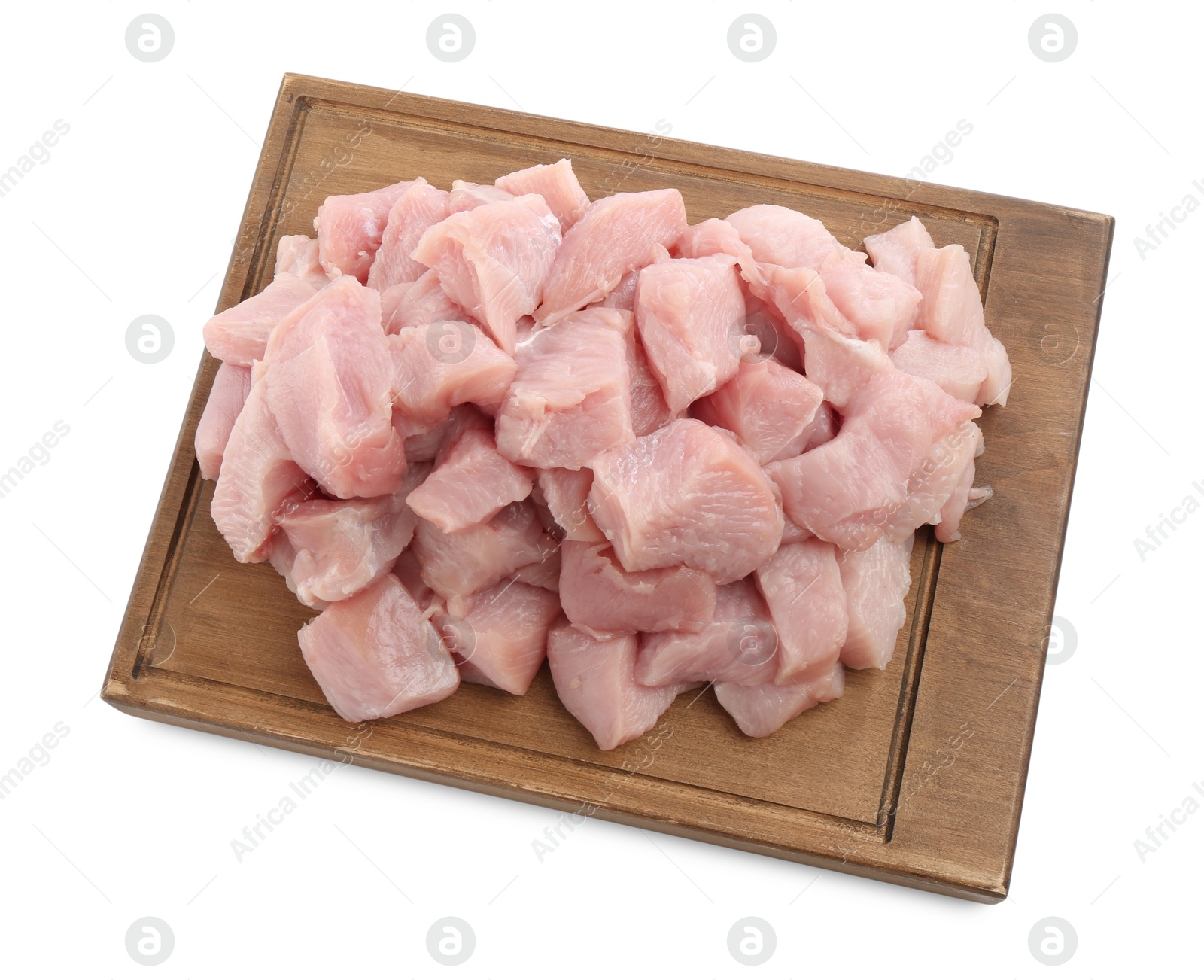 Photo of Wooden board with pieces of raw turkey meat isolated on white, top view