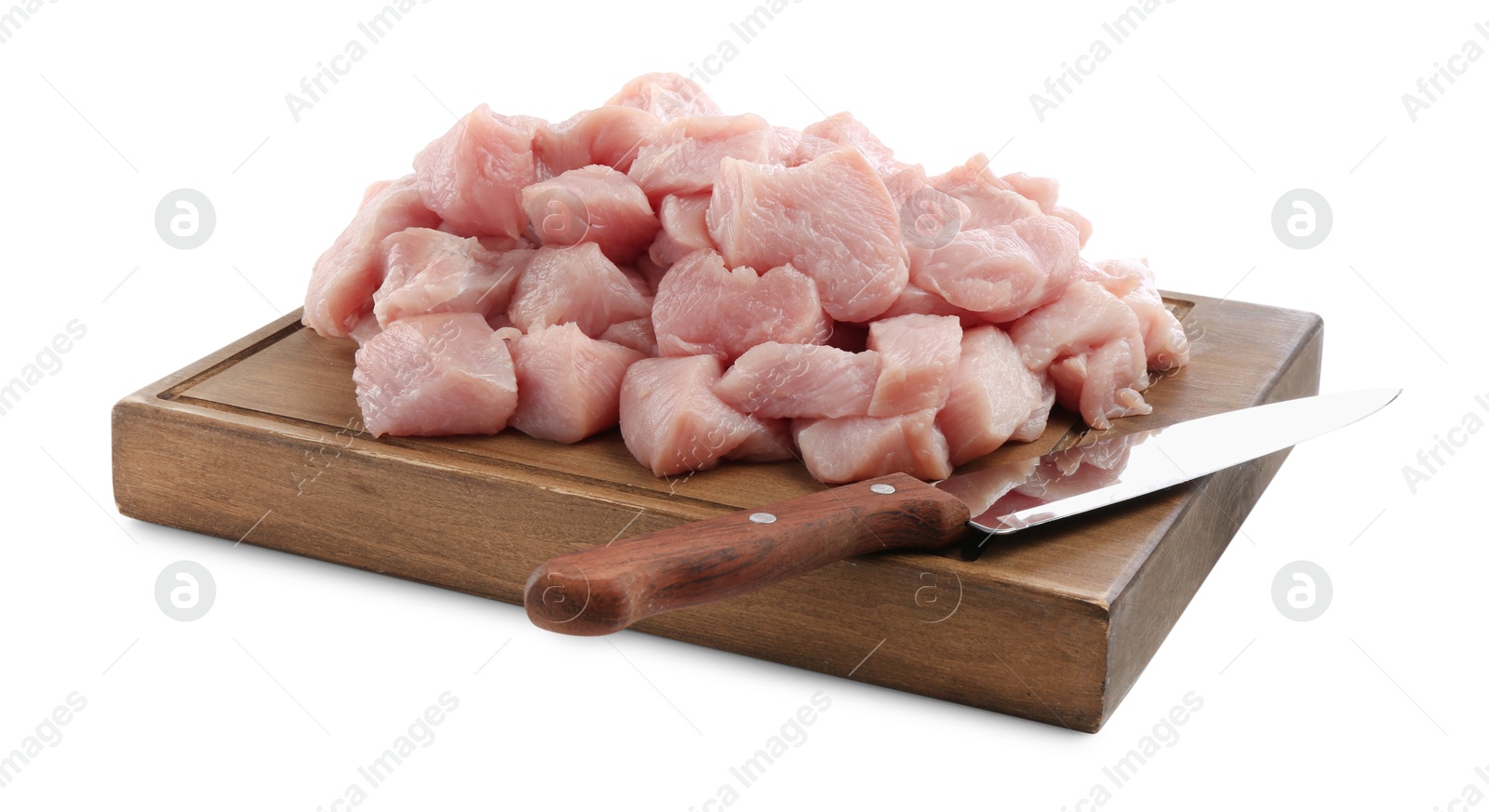 Photo of Wooden board with pieces of raw turkey meat and knife isolated on white