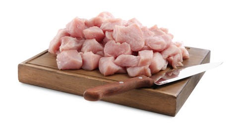 Photo of Wooden board with pieces of raw turkey meat and knife isolated on white