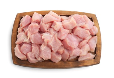 Photo of Wooden board with pieces of raw turkey meat isolated on white, top view