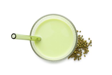 Photo of Fresh mung bean juice in glass and seeds isolated on white, top view