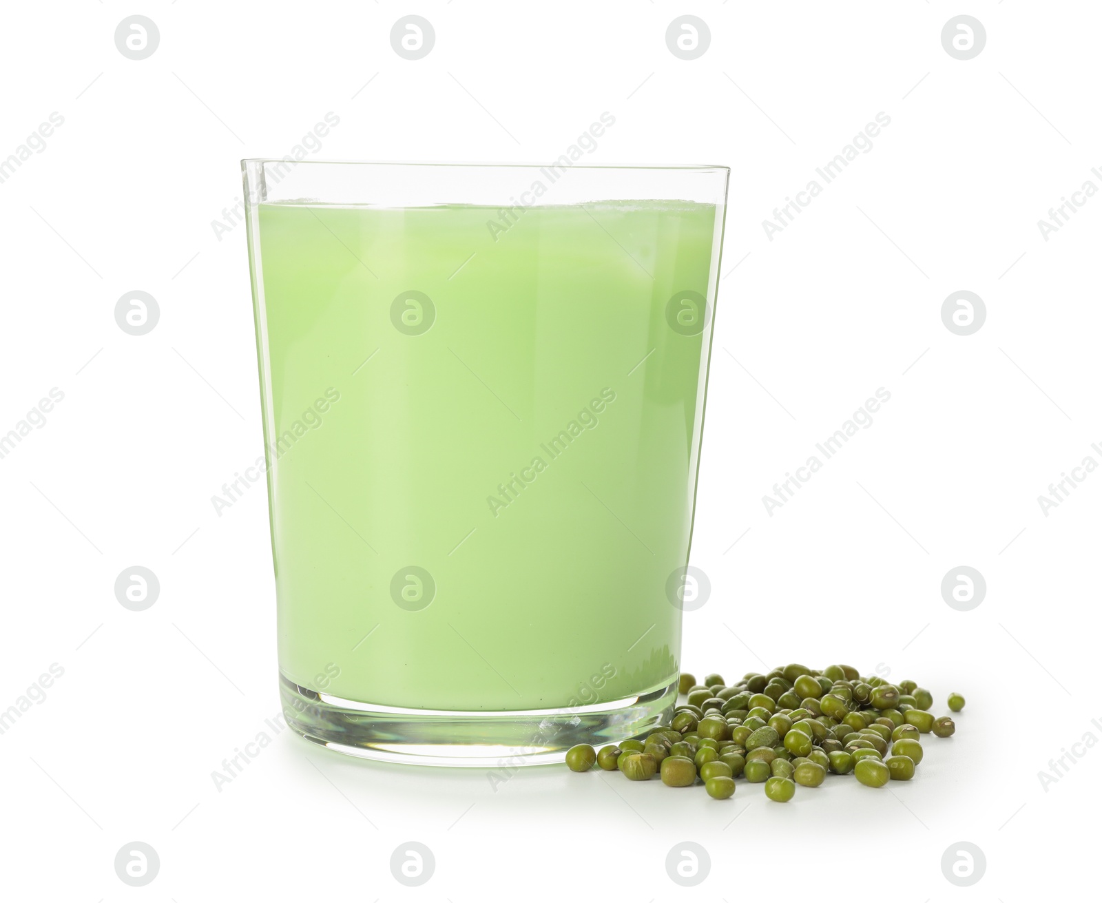 Fresh mung bean juice in glass and seeds isolated on white Photo of Fresh mung bean juice in glass and seeds isolated on white