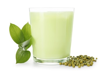 Photo of Fresh mung bean juice in glass, seeds and green leaves isolated on white
