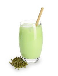 Photo of Fresh mung bean juice in glass and seeds isolated on white