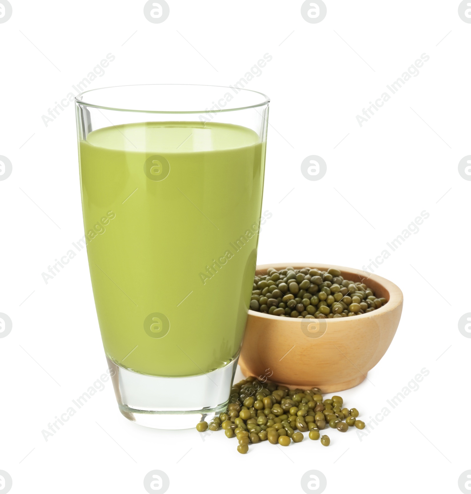 Fresh mung bean juice in glass and seeds isolated on white Photo of Fresh mung bean juice in glass and seeds isolated on white