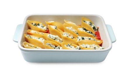 Photo of Delicious pasta with ricotta cheese, spinach and tomato sauce in baking dish isolated on white