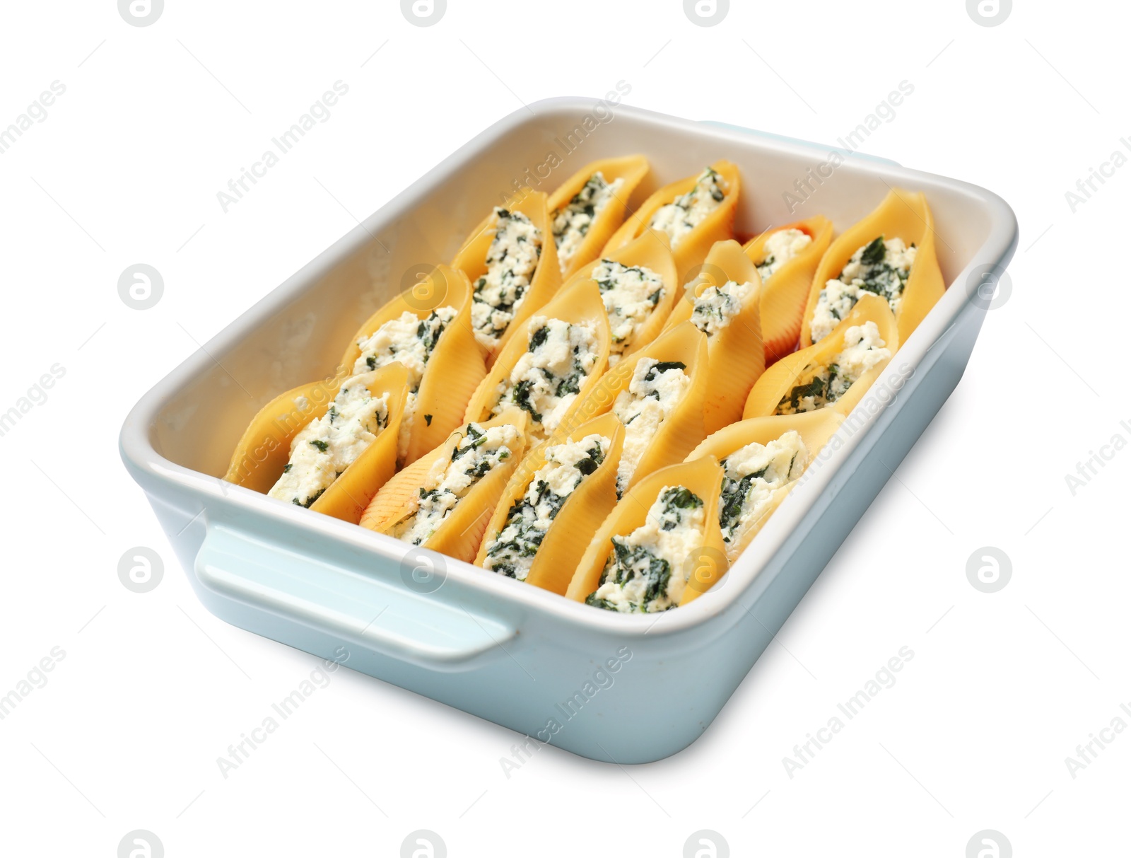 Photo of Delicious pasta with ricotta cheese and spinach in baking dish isolated on white