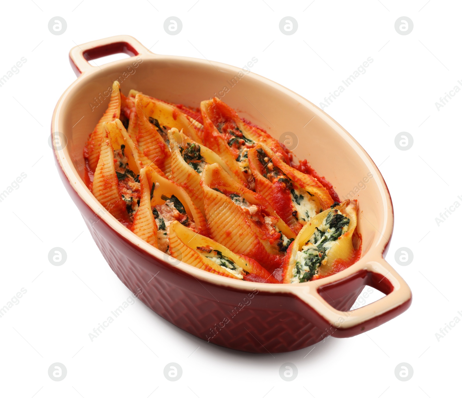 Photo of Delicious pasta with ricotta cheese, spinach and tomato sauce in baking dish isolated on white