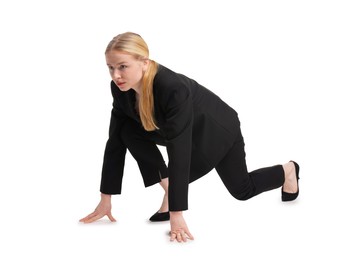 Photo of Businesswoman in starting position for run ready for competition on white background