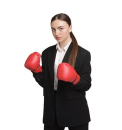 Photo of Competition. Businesswoman in suit wearing boxing gloves on white background