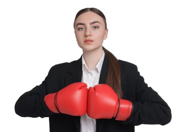 Photo of Competition. Businesswoman in suit wearing boxing gloves on white background