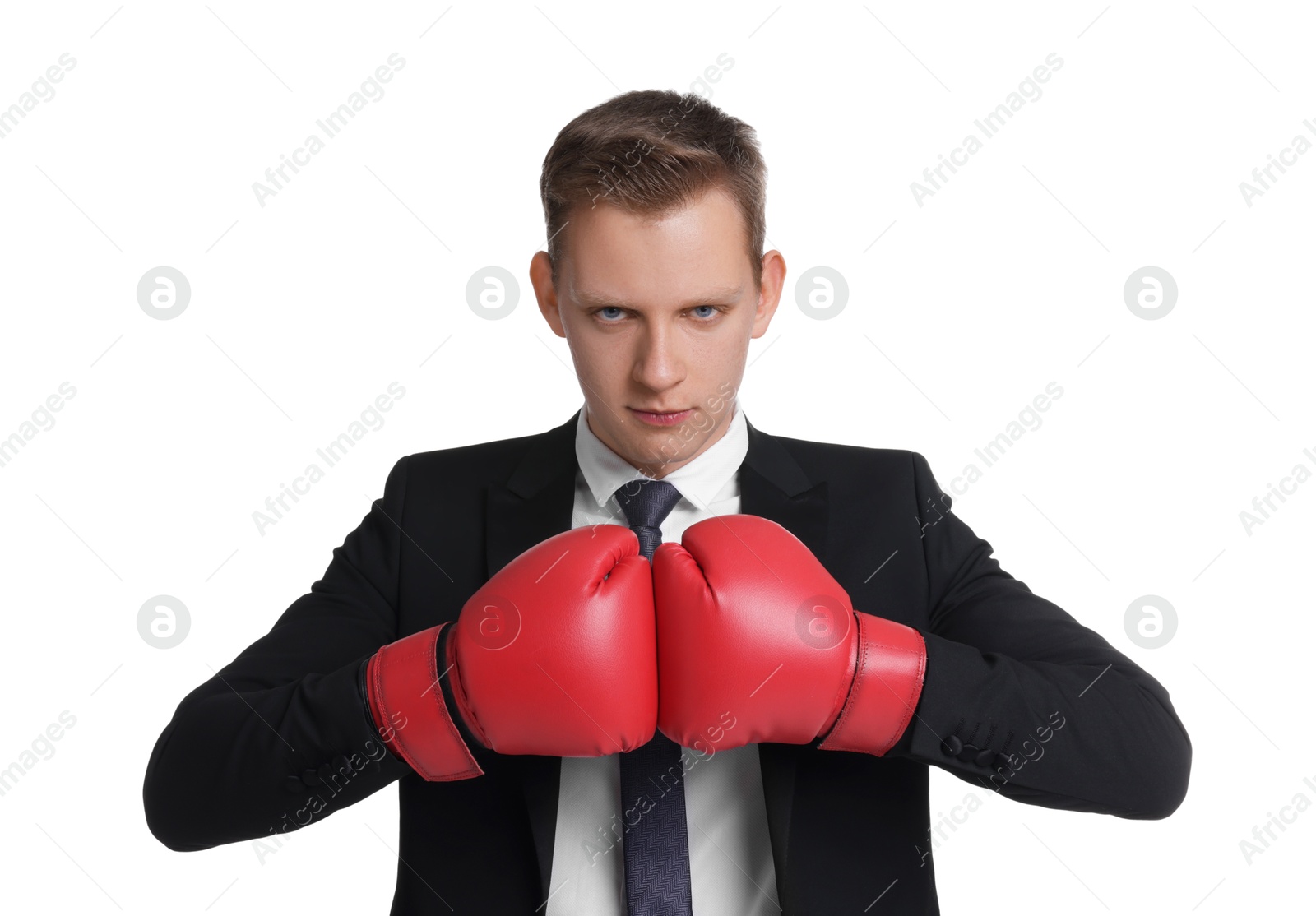 Photo of Competition. Businessman in suit wearing boxing gloves on white background