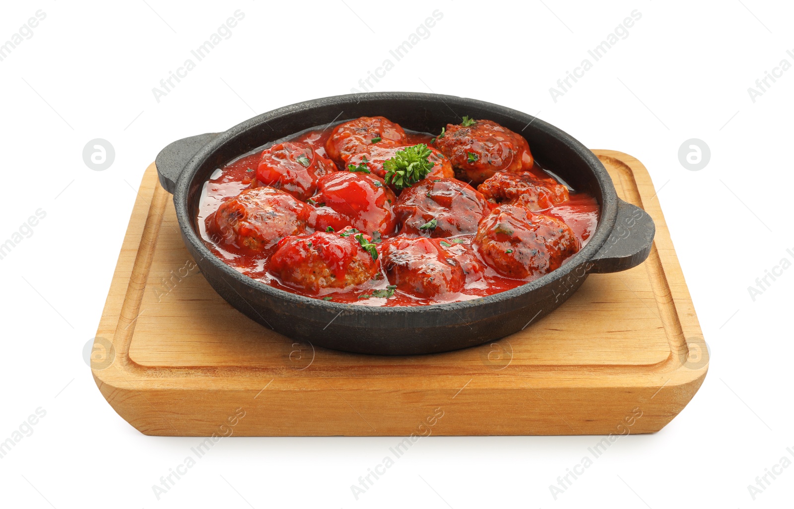 Photo of Delicious meatballs with tomato sauce in baking dish isolated on white