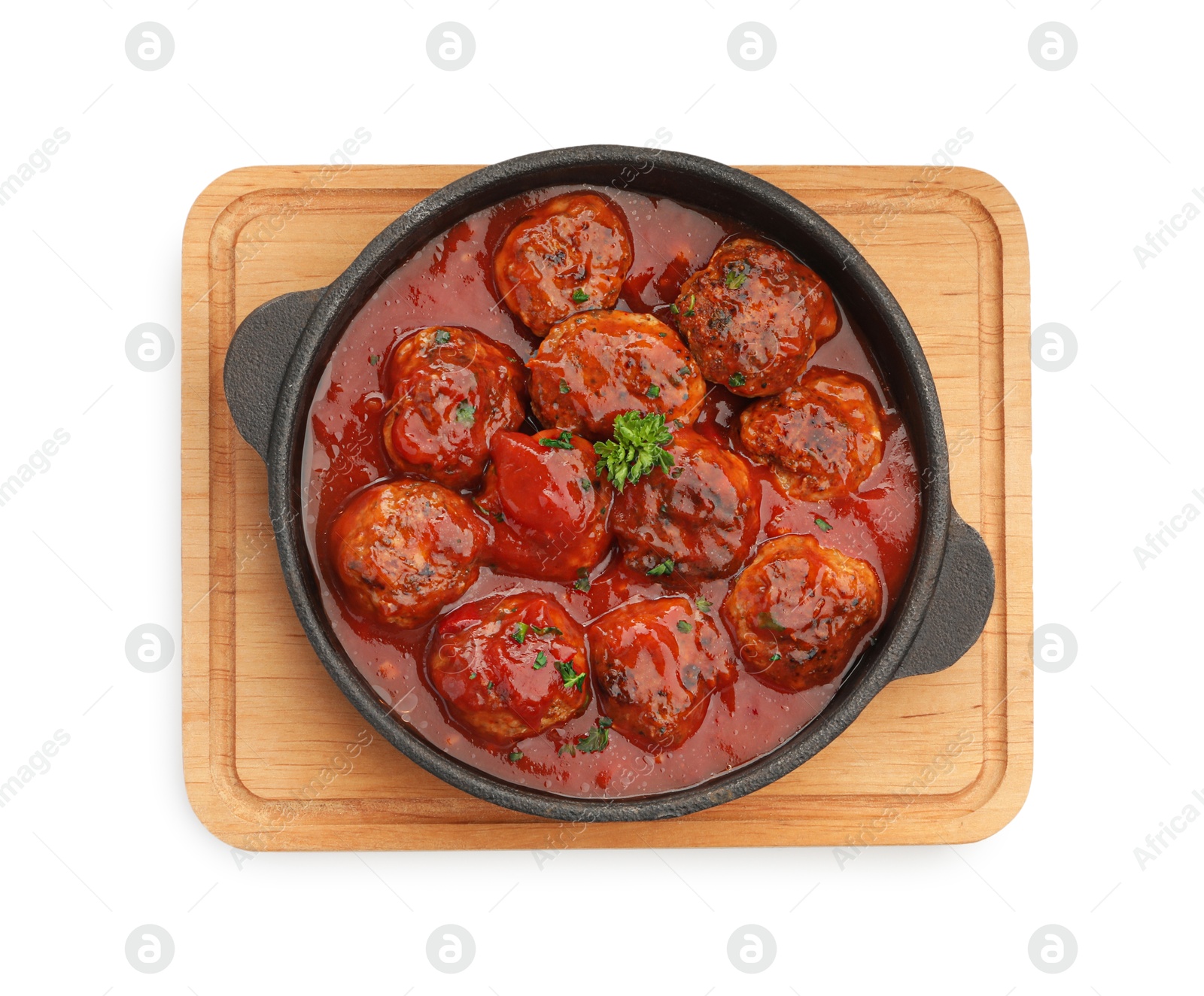 Photo of Delicious meatballs with tomato sauce in baking dish isolated on white, top view