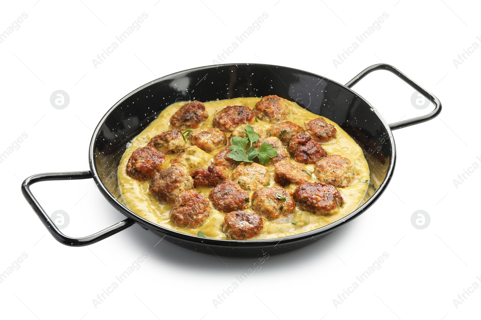 Photo of Delicious meatballs with gravy cream sauce and herbs isolated on white