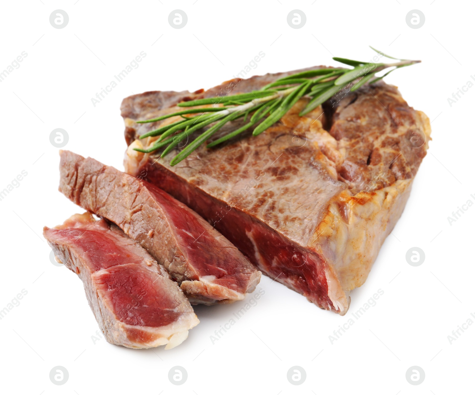 Photo of Pieces of delicious beef meat and rosemary isolated on white