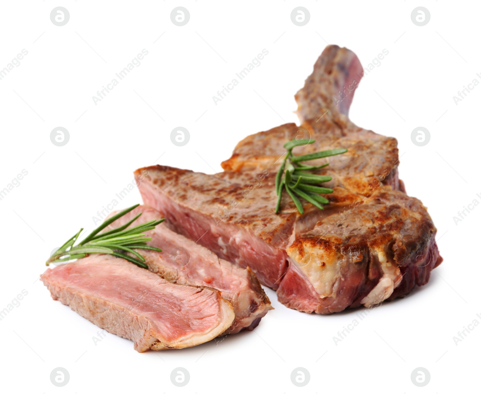 Photo of Pieces of delicious beef meat and rosemary isolated on white