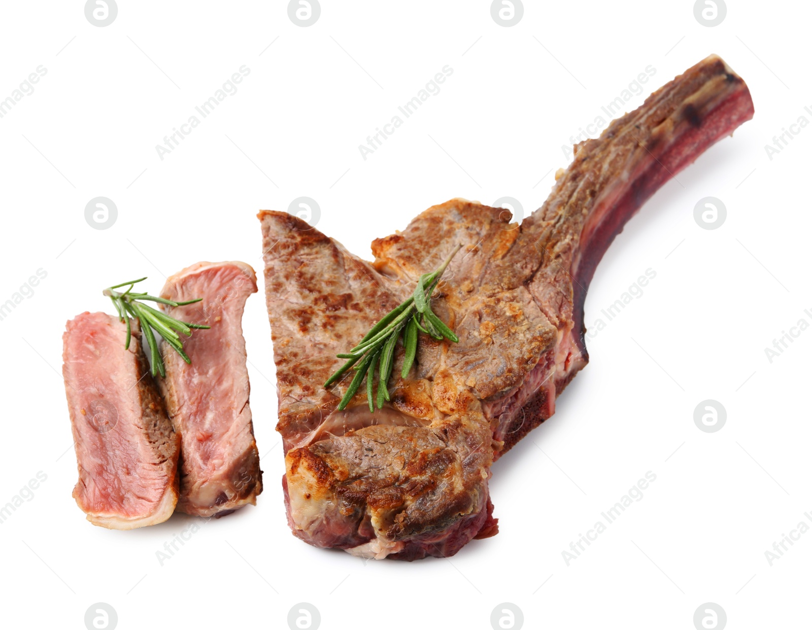 Photo of Pieces of delicious beef meat and rosemary isolated on white, above view