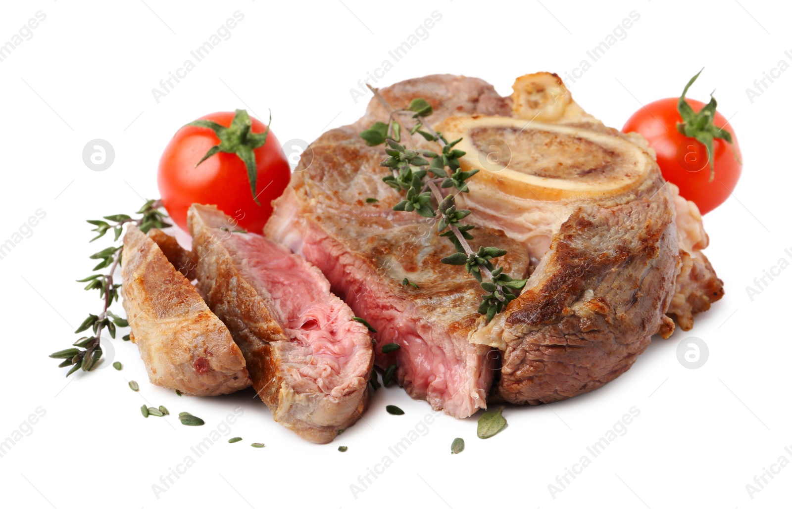 Photo of Pieces of delicious beef meat, thyme and tomatoes isolated on white