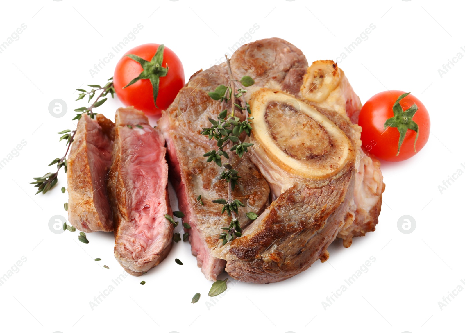 Photo of Pieces of delicious beef meat, thyme and tomatoes isolated on white