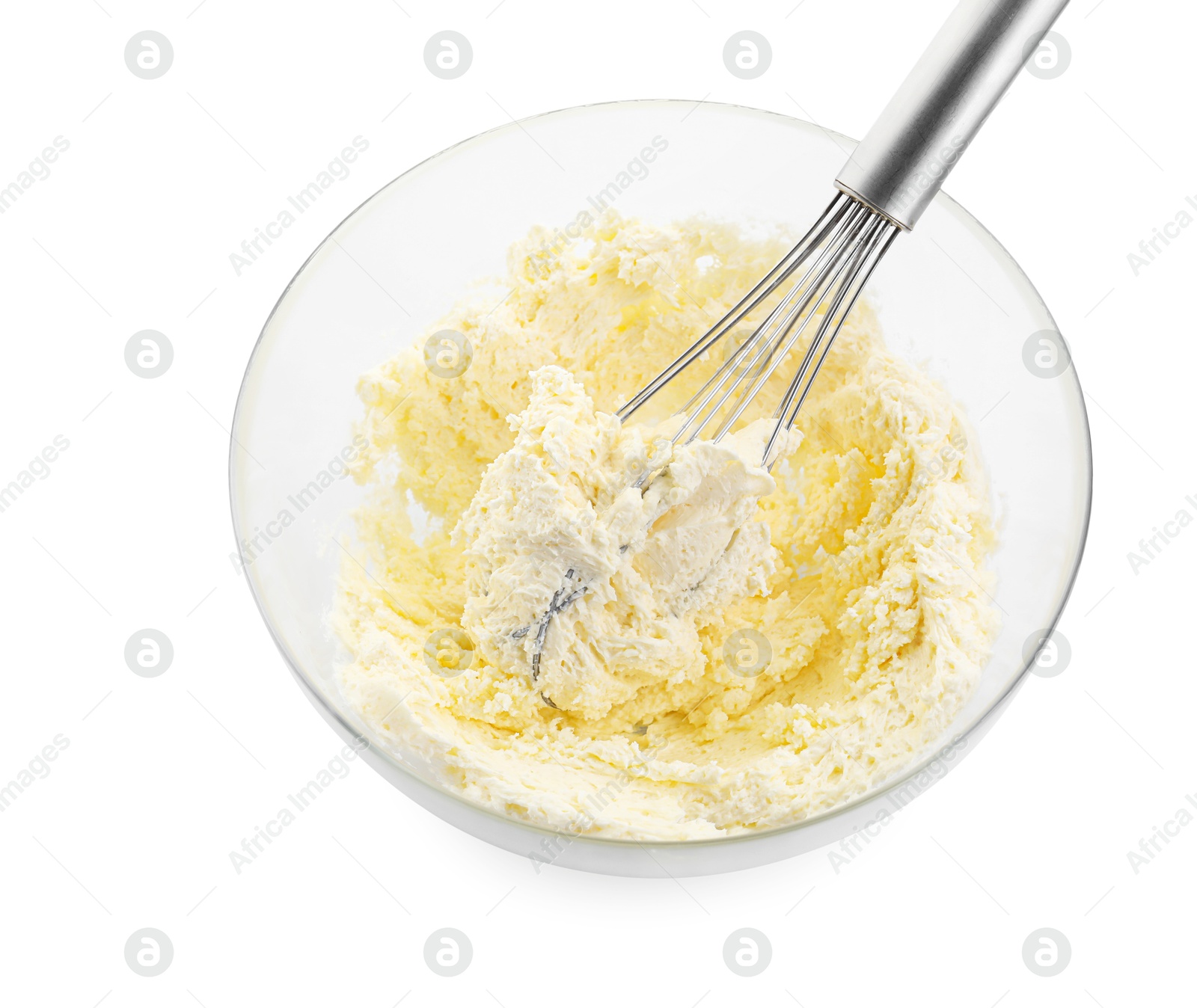 Photo of Bowl and whisk with delicious cream isolated on white