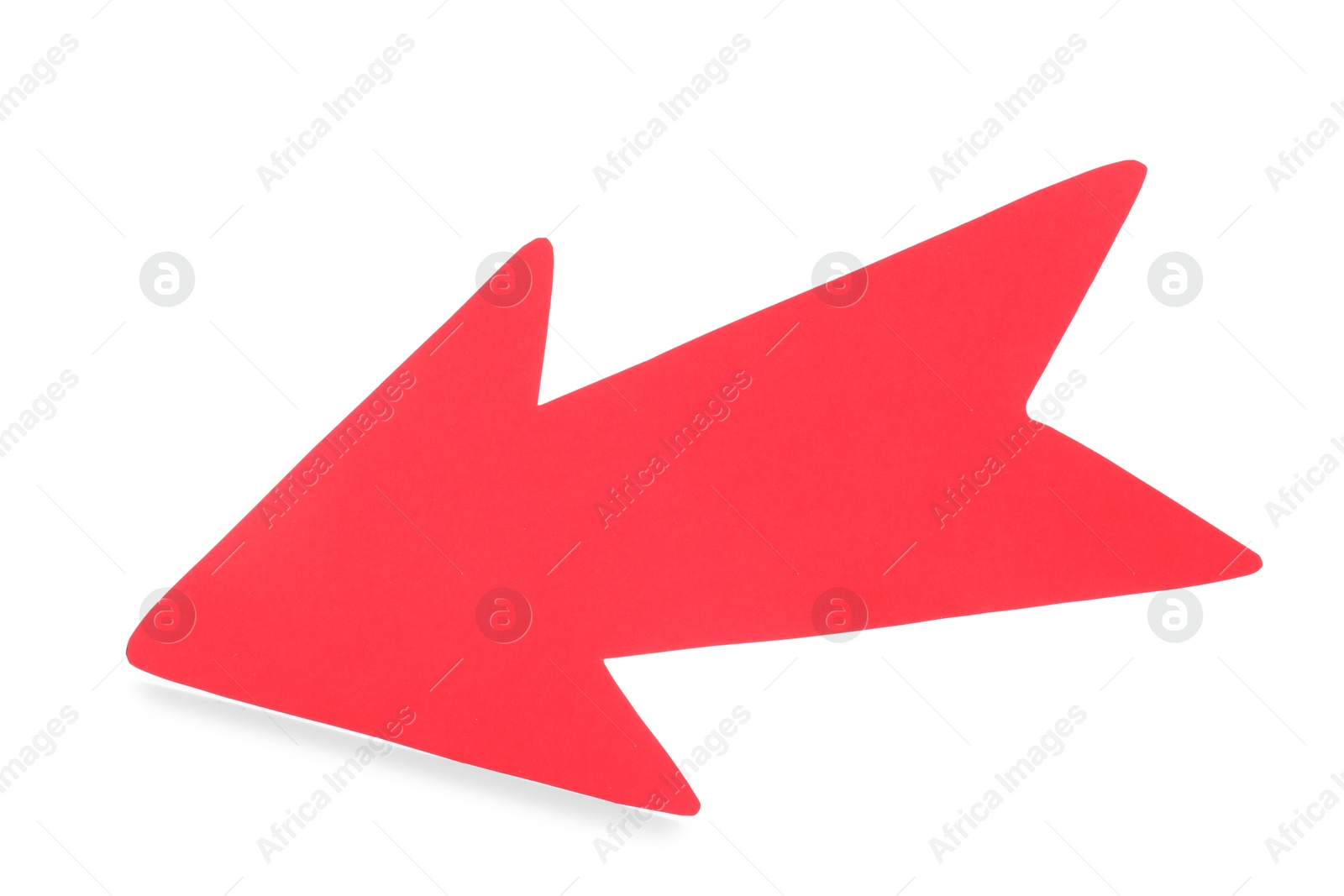 Photo of One red paper arrow isolated on white