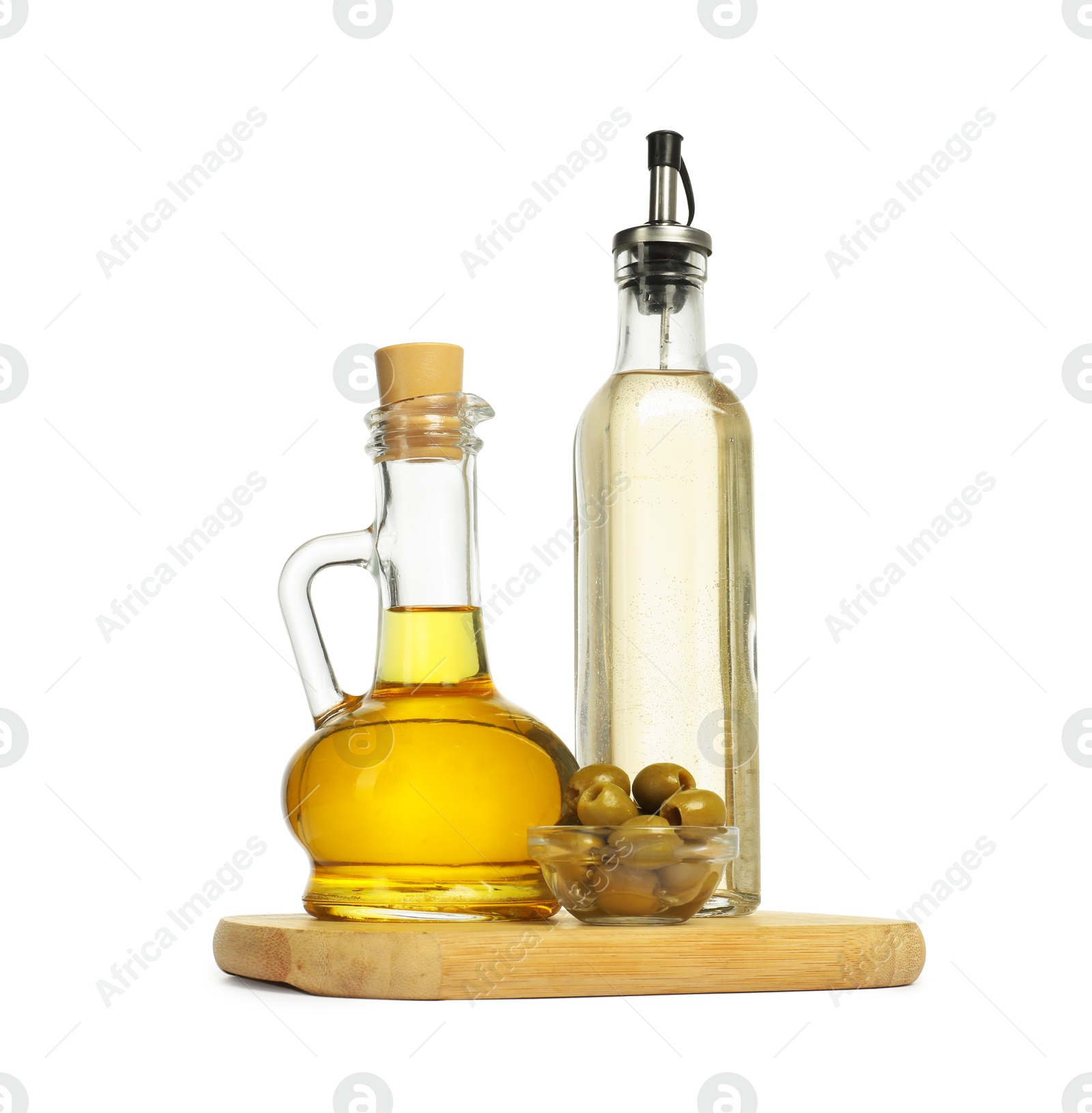 Photo of Salad dressings and olives isolated on white