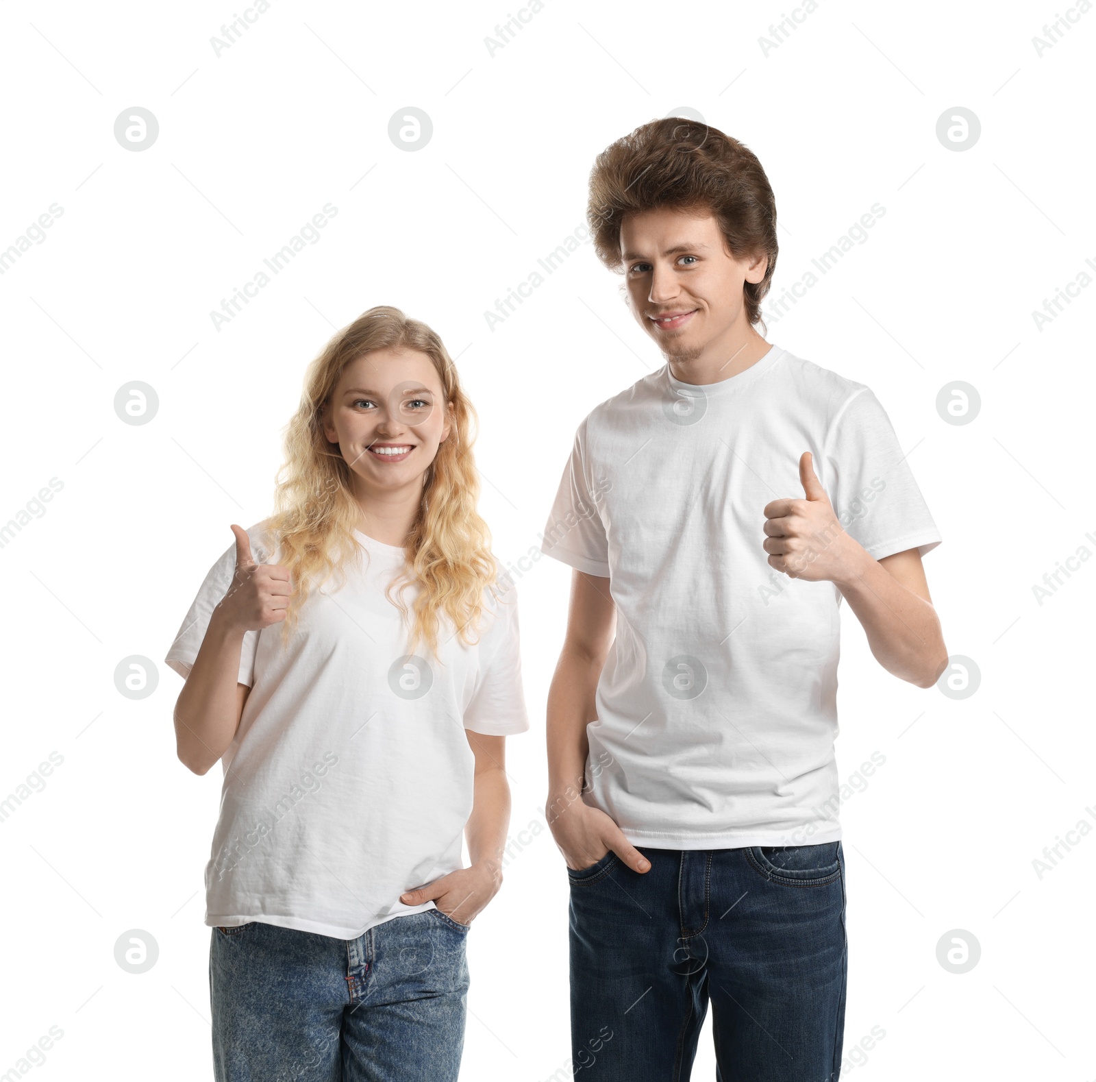 Photo of Young woman and man wearing blank t-shirts on white background. Mockup for design