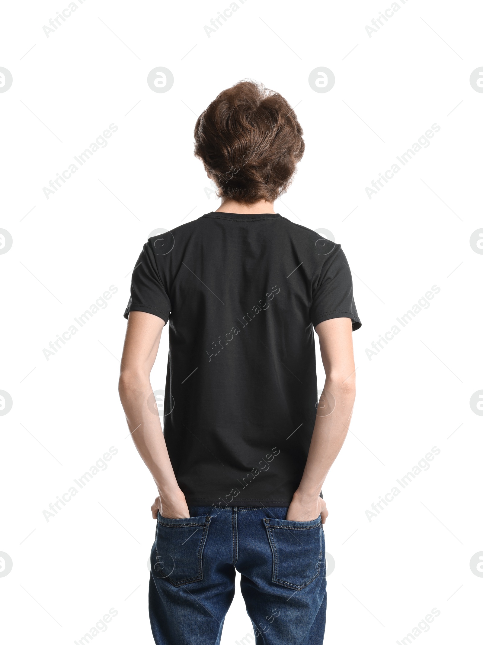 Photo of Young man wearing blank black t-shirt on white background, back view. Mockup for design