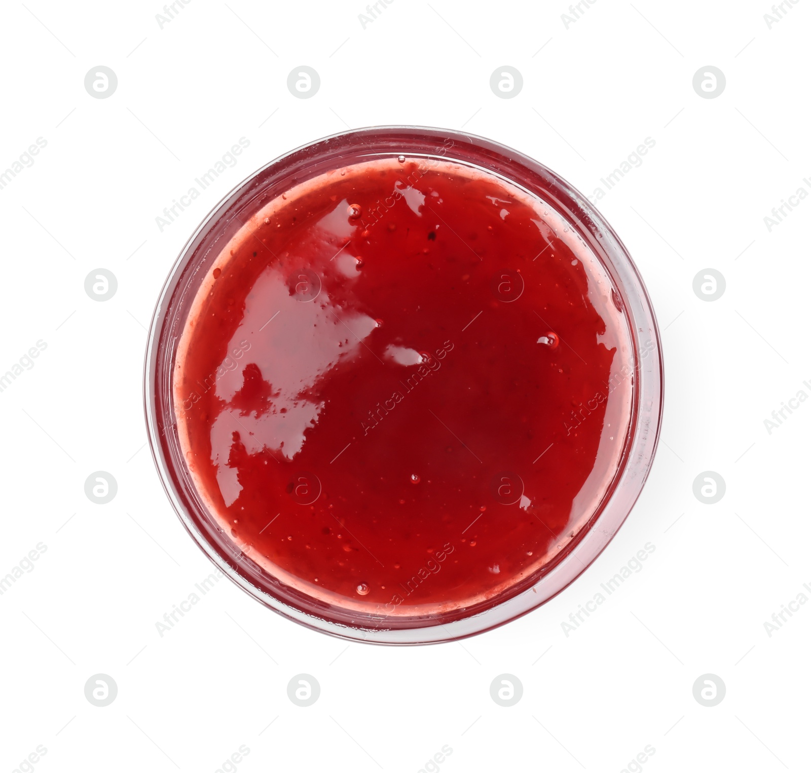 Photo of Tasty strawberry sauce in bowl isolated on white, top view