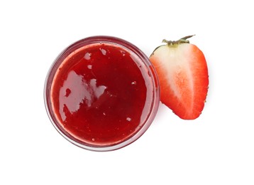 Photo of Tasty strawberry sauce in bowl and fresh berry isolated on white, top view